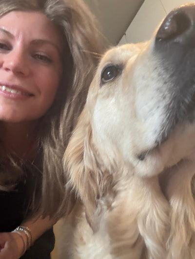 Woman with a dog, close-up of their faces